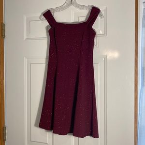 Xtraordinary burgundy dress size 7.